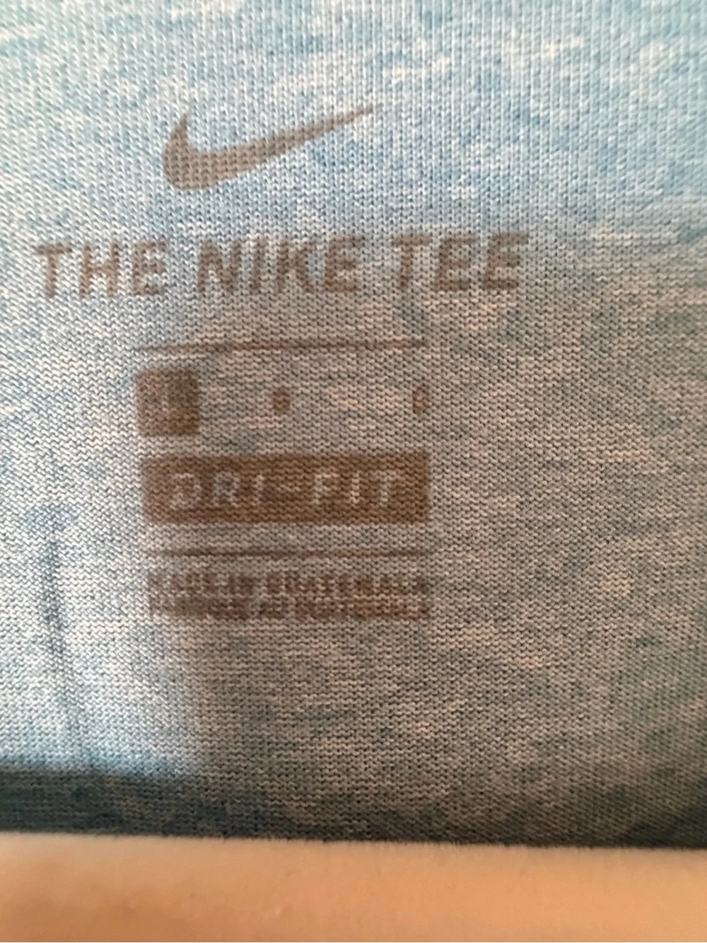 Nike Women’s Light Blue Athletic Tank Top with Black Swoosh